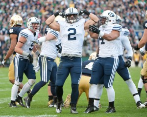 Spencer Hadley celebrates a tackle he made in the game against Notre Dame last season. Photo courtesy AP Photo.