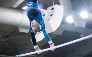 Natalie Eyre-Pickard competes on the uneven bars. Photo by Chris Bunker