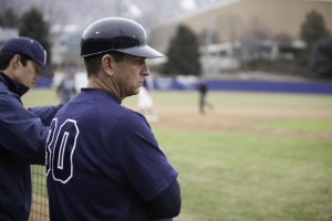BYU coach Mike Littlwood surveys the field during BYU's home-opener series. (Elliott Miller)