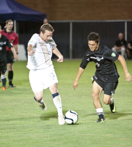 Forward Garrett Losee moves the ball past an opponent during a game last year. Losee, Brian Hale and Colby Bauer will represent BYU men's soccer at the 2013 USL Pro Combine.