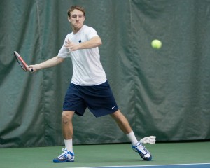 BYU junior Patrick Kawka returns the ball during a recent home match against Utah State. The Cougars play their last home match of the season Saturday. (Photo by Chris Bunker)