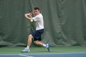 BYU tennis player Francis Sargeant returns the ball during Saturday's match against Utah State at the Indoor Tennis Courts. Photo courtesy BYU Athletics.