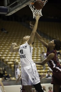BYU's Morgan Bailey attempts a layup despite defense from LMU's Sophie Taylor in the game earlier this season. Photo by Universe Photographer.