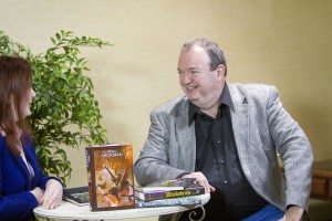 Author Tracy Hickman speaks on camera about his books at the annual Life, the Universe, and Everything conference about fantasy literature. Photo by Sarah Hill.