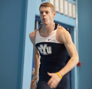 BYU Junior Phillip Bettis sprints down his lane before attempting a long jump in the Smith Fieldhouse. (Photo by Luke Hansen)