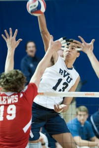 Ben Patch goes up for a hit in a game against Lewis in the Smith Fieldhouse.