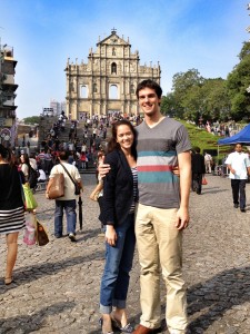 Spencer Christensen, who works for one of Singapore's sovereign wealth funds, and his wife Channing, who works for Facebook, pose in front of the Cathedral of St. Paul in Macau. The Christensen's have a goal to travel to a new country once a month. (Photo courtesy Spencer Christensen)