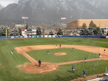 Snow in the mountains covered their view, but the sun was shining on the baseball field. (Photo by Jon Uland)