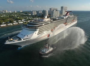 The Carnival Legend, a 2,100-passenger, 960-foot-long cruise ship arrives at Port Everglades in Fort Lauderdale, Fla., in this Nov. 8, 2002 file photo. Carnival Cruise Lines says another of its ships has experienced problems and is heading back to the Port of Tampa. Late Thursday, March 14, 2013 the company said "a technical issue" affecting the sailing speed of the Legend forced the cancellation of a stop at Grand Cayman Islands. The Carnival Dream experienced problems with an on-board generator while docked in St. Maarten and the company announced Thursday that passengers would be flown home. (AP Photo/Carnival Cruise Lines, Andy Newman, File)