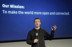 Facebook CEO Mark Zuckerberg speaks at Facebook headquarters in Menlo Park, Calif., Thursday, March 7, 2013. Zuckerberg on Thursday unveiled a new look for the social network's News Feed, the place where its 1 billion users congregate to see what's happening with their friends, family and favorite businesses.(AP Photo)