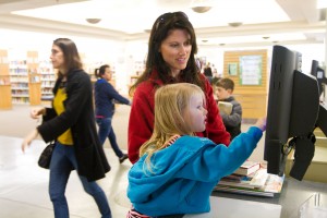 Tracy Steck and her daughter use the resources at the Provo Library. (Photo by Sarah Hill)