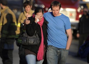 FILE - In this Dec. 14, 2012 file photo, Alissa Parker, left, and her husband, Robbie Parker,  leave the firehouse staging after receiving word that their six-year-old daughter Emilie was one of the 20 children killed in the Sandy Hook School shooting in Newtown, Conn.  Alissa Parker told CBS This Morning in an interview that aired Thursday, March 21, 2013, that she wanted to meet with Adam Lanza's father, Peter Lanza, to tell him something she needed to get out of her system. It's not clear what that something was. CBS planned to show the rest of the interview with Alissa and Robbie Parker on Friday morning revealing more details about their meeting with Peter Lanza.   (AP Photo/Jessica Hill)