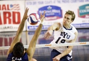 Middle blocker Devin Young spikes the ball against Cal Baptist earlier this season (Photo by Sarah Hill)
