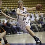 Ashley Garfield dribbles the ball up to the hoop in Thursday's game against Idaho State. (Photo by Elliott Miller)
