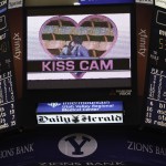 A couple kissed on the Kiss Cam at a BYU women's basketball game this season. (Photo by Elliott Miller)
