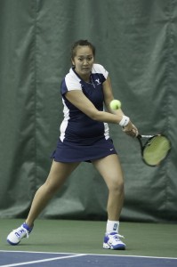 BYU's Desiree Tran hits returns a serve earlier this season. Tran secured the winning point for BYU Monday in its 4-3 win against Washington State.