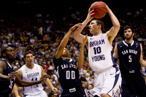 Matt Carlino drives to the hoop against San Diego during the game in Provo.