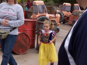 Eleanor Anderson is having fun in the Disneyland with her parents.