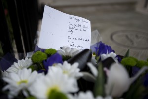 A floral tribute is seen after being laid outside the home of the late former British Prime Minister Margaret Thatcher in London, Monday, April 8, 2013.  