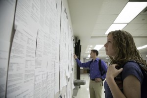 BYU students Ariel Jay and Jared Bruton search the job board. (Photo by Elliott Miller)