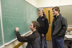 Peter Baratta (left), Sam Dittmer (middle) and Hiram Golze, who took a school-record seventh place at theWilliam Lowell Putnam Mathematical Competition. Photo courtesy BYU Mathematics Department.