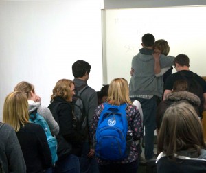 Students lined up after class to express their thanks to Black (center). Photo by Gabriel Meyr.