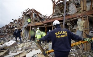 FILE - In this Thursday, April 18, 2013 file photo, emergency personnel search the rubble of an apartment destroyed by an explosion at a fertilizer plant in West, Texas. Event after nail-biting event, America was rocked this week, in rare and frightening ways, with what felt like an unremitting series of tragedies. (AP Photo/LM Otero, File)