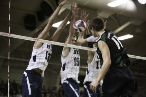 Ben Patch, Taylor Sander and Devin Young block a kill in the opening round game of the conference tournament against Hawaii. (Photo by Elliott Miller)