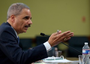 In this April 18, 2013 file photo, Attorney General Eric Holder testifies on Capitol Hill in Washington. The Justice Department has secretly obtained two months of telephone records of journalists for The Associated Press in what AP's top executive says is an unprecedented intrusion into newsgathering. (AP Photo/Molly Riley, 