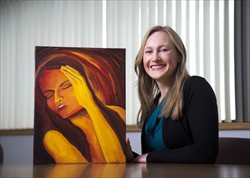 Emily Bates with her painting.
