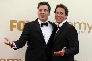 Jimmy Fallon, left, and Seth Meyers at the 63rd Primetime Emmy Awards in Los Angeles.  (Associated Press)