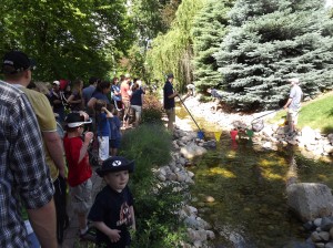 Participants in the 2012 Ducky Derby anxiously wait at the finish line. (Photo courtesy )