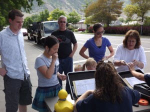 Racers in the 2012 Ducky Derby register their ducks (Photo Courtesy )