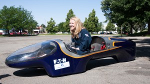Driver Caroline sits in the Super Gas Mileage car on Tuesday morning.