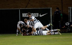 The Cougars celebrate a go-ahead goal in the 89th minute by freshman Blake Frischnecht. Photo by Chris Bunker