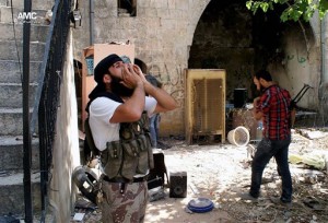A Syrian rebel shouting "Allahu Akbar" (God is Great) in the Old City of Aleppo, Syria. A group of U.S. Senators want to see the U.S. do more than provide arms to some of the outgunned rebels in the bloody civil war in Syria. Democratic Sens. Robert Menendez and Carl Levin and Republican John McCain say in a joint letter to Obama that the U.S. should consider targeting regime airfields, runways and aircraft, and help rebels establish safe zones in Syria. (AP Photo/Aleppo Media Center AMC)