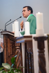 Father Fernando Velasco preaches to a congregation at St. Francis of Assisi in Orem on July 28.