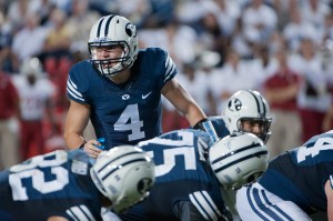 BYU quarterback Taysom Hill shouts out instructions before a play against Washington State during Thursday's game at LaVell Edwards Stadium. Photo by Chris Bunker