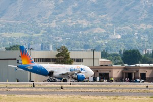 Crews unload an Allegiant Air flight on the Provo Municipal Airport runway. (Photo by Chris Bunker)