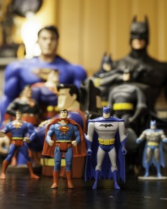 Various Batman and Superman action figures and memorabilia display the long history of the two characters, soon to star in a movie together. (Photo by Elliott Miller)