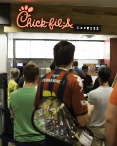 Customers wait in line at Chick-fil-A in the Cougareat, which will officially open on Sept. 4.