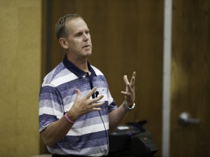 Tom Holmoe spends time talking about BYU's athletic department. (Photo by Elliott Miller)