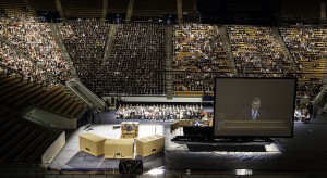 Elders and Sisters attend their Tuesday evening devotional in the Marriott Center this summer to accommodate the larger number of missionaries. Photo by Elliott Miller