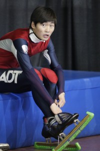  In this Sept. 30, 2012, file photo, the United States' Simon Cho adjusts his skates after racing in a 500 meter semifinal at the U.S. Single Distance Short Track Speedskating Championship in Kearns, Utah. Cho received a two-year suspension from the International Skating Union on Sunday, Aug. 25, 2013,  after admitting he tampered with the skates of a Canadian rival. U.S. Speedskating announced the suspension, which runs through Oct. 4, 2014. That means Cho would not be eligible to compete for the American short track team at the Sochi Olympics. (AP Photo by Rick Bowmer)