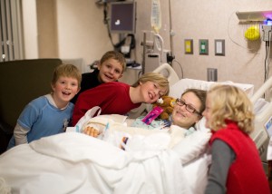 Madeline Hardy recovers in the hospital surrounded by nieces and nephews. Hardy suffered major fractures in her arms and pelvis, but is now fully rehabilitated, running again and attending school. (Photo courtesy Madeline Hardy)