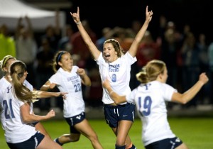 Paige Hunt celebrates the game-tying goal in the final minutes of the comeback victory against Oklahoma on Thursday night. Photo courtesy BYU Photo.