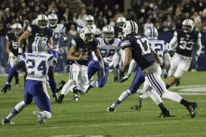 Taysom Hill keeps the ball for a gain against Middle Tennesse in Friday night's game. (Photo by Maddi Dayton)