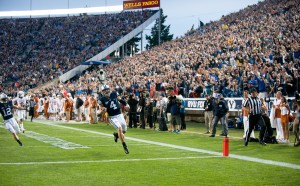 Quarterback Taysom Hill reaches the end zone on a 68-yard touchdown run in the first quarter of BYU's win against Texas. (Photo by Sarah Hill.)