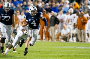 Quarterback Taysom Hill runs the ball during the Sept. 7 game vs. Texas at LaVell Edwards Stadium. (Photo by Sarah Hill.)