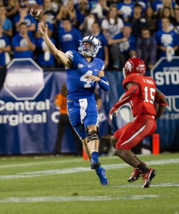 Taysom Hill lobs the ball to a wide receiver during the game against Utah at LaVell Edwards Stadium. Photo by Sarah Hill.